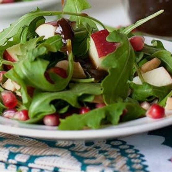 Pomodoro rucola e salsa di melograno - una porzione