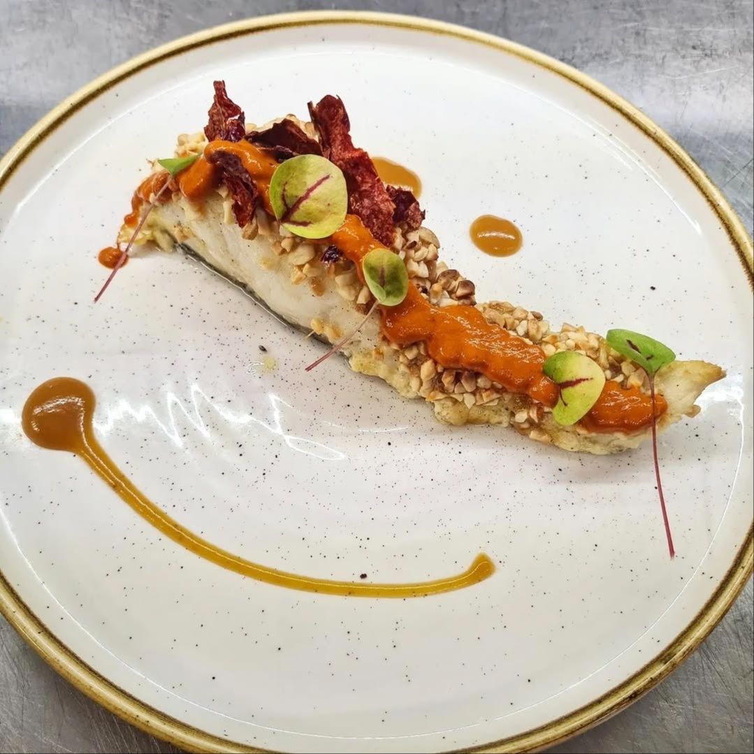 Baccalà mandorlato con cipolla caramellata di tropea