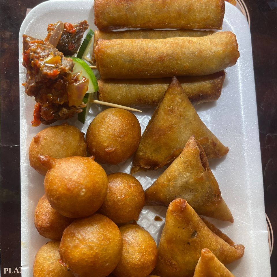 4 samosa and 4 spring rolls with 10 puff puff and 3 chicken
