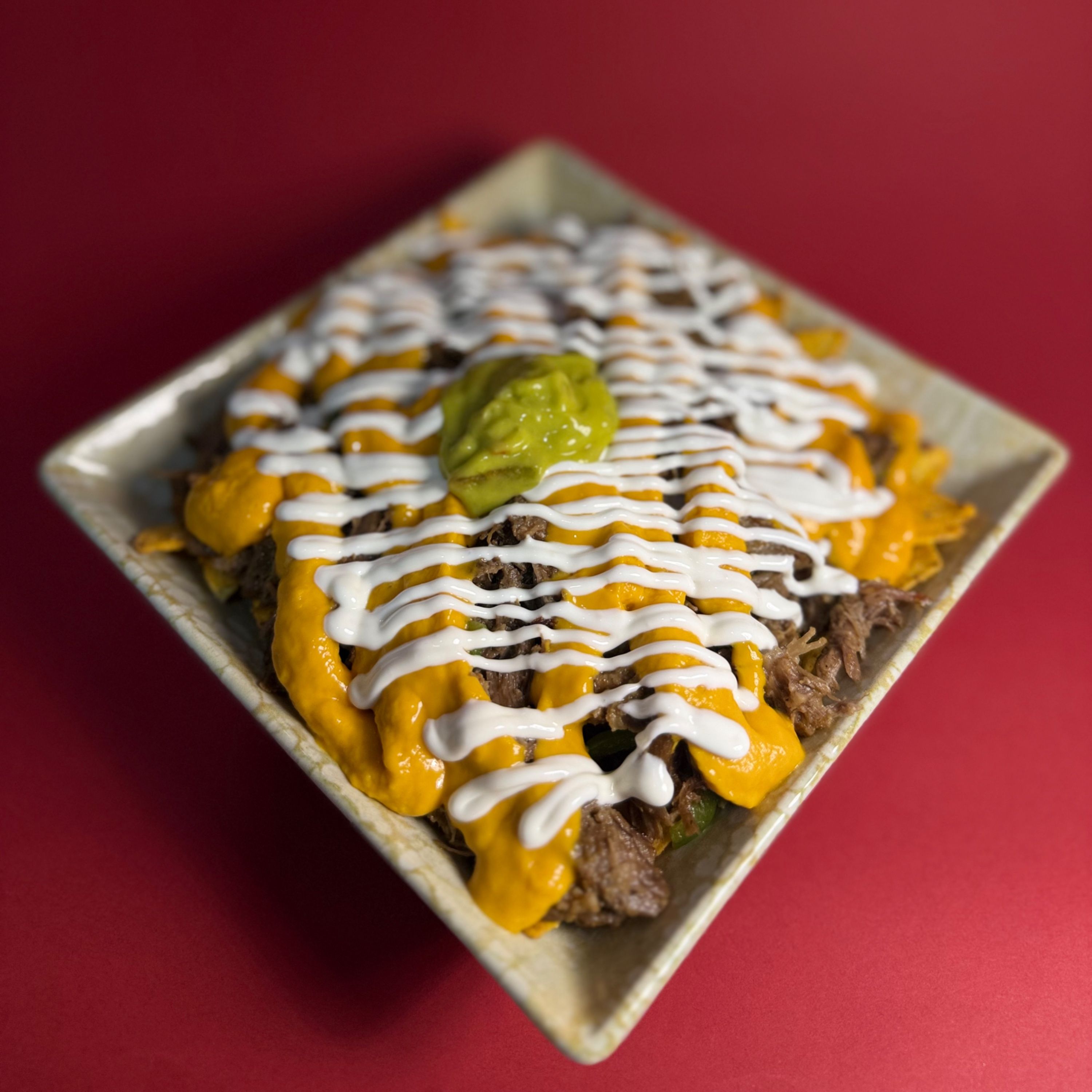 NACHOS COM PORCO ( MEIA PORÇÃO) 