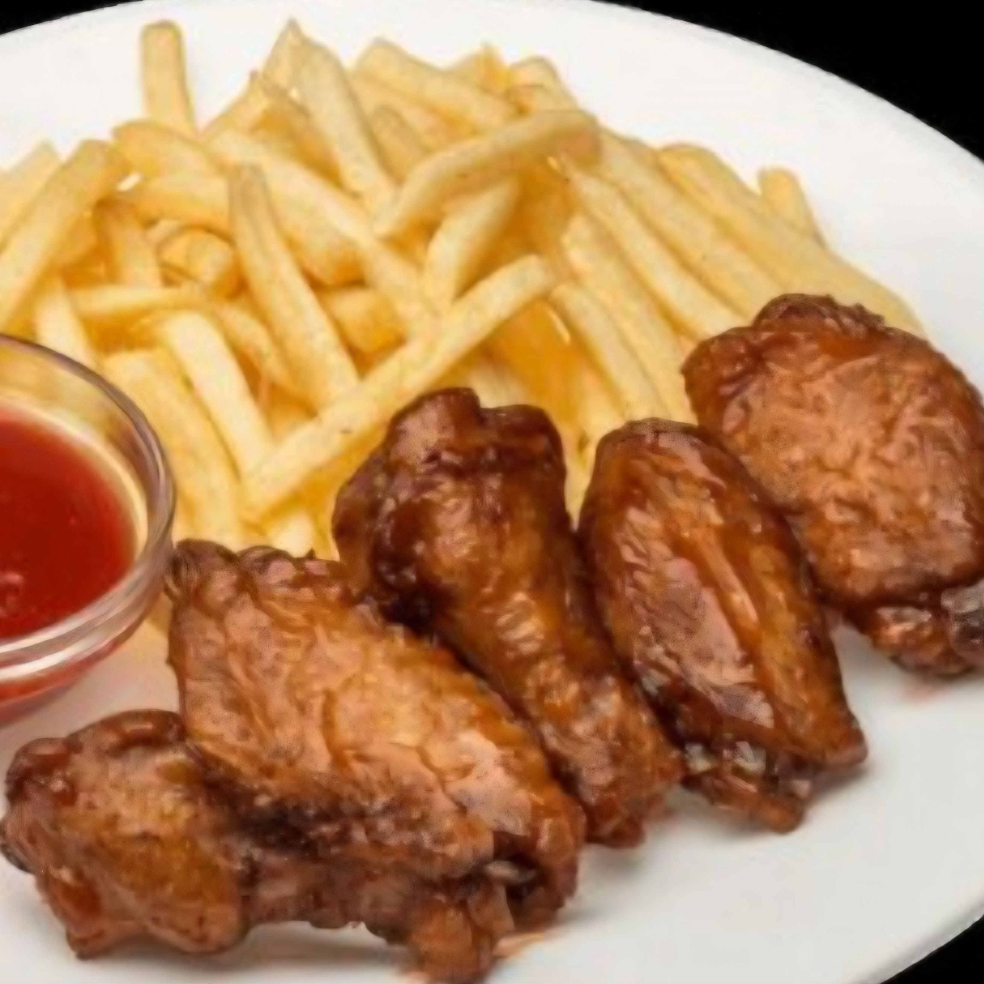 Aripioare de pui cu cartofi prajiti