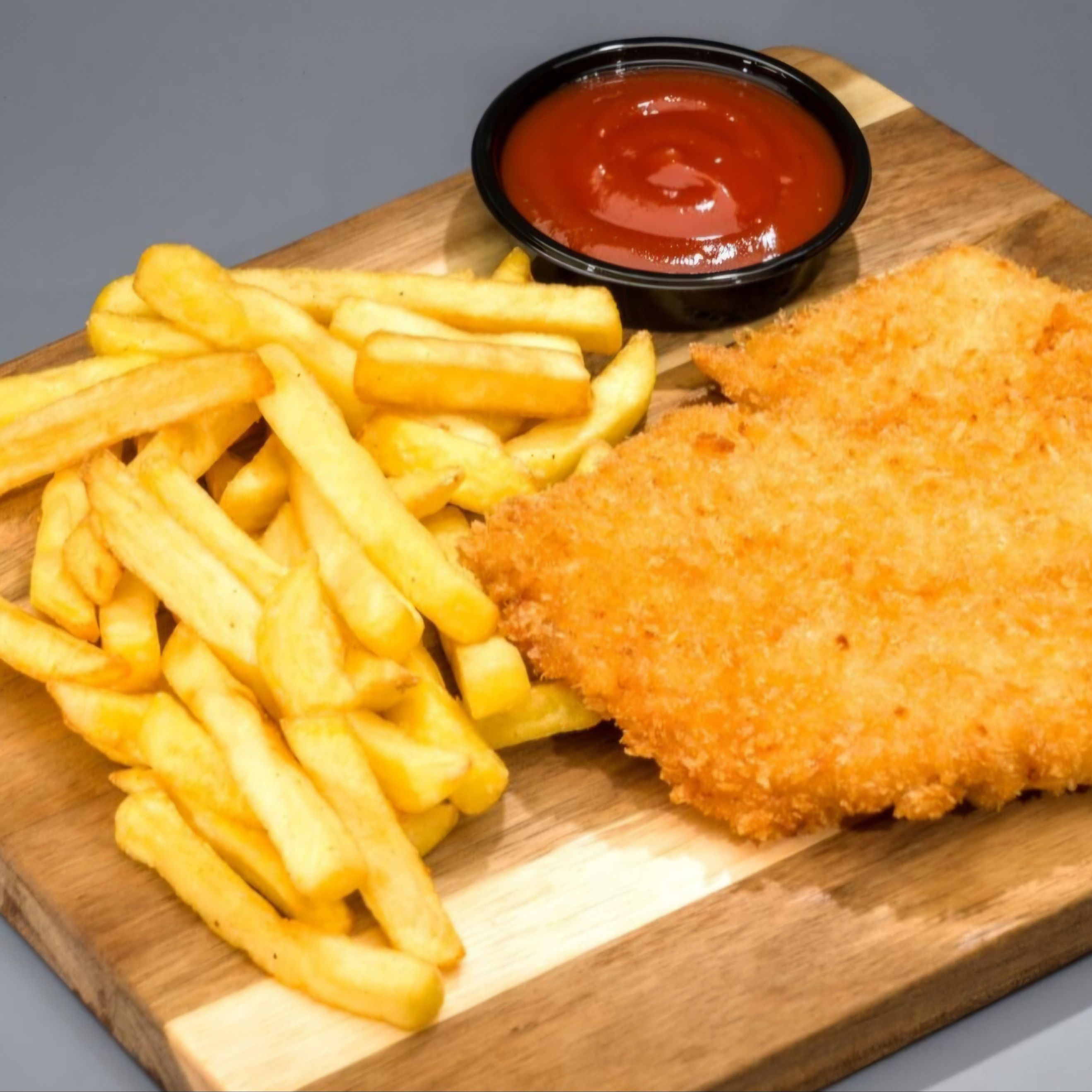 Snitel de pui cu cartofi crocanti