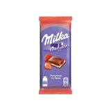 Шоколад 90 г Milka молочний з кремовою та полуничною начинкою