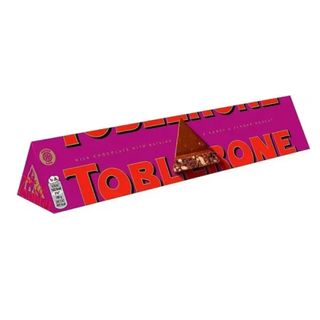 Шоколад Toblerone Молочний З Родзинками 100г

