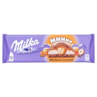 Шоколад Milka з ціл. горіх та карамеллю 300г