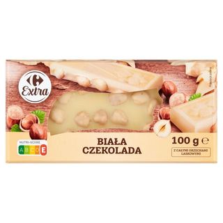Carrefour Extra Biała czekolada z całymi orzechami laskowymi 100 g