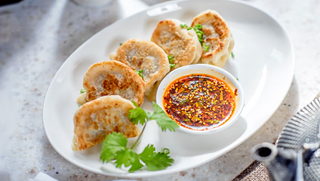 Пельмени с говядиной жареные (220г)