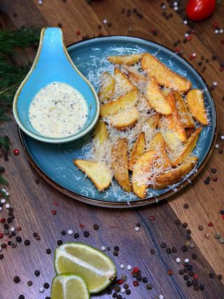 Картофельные дольки с пармезаном (210г)