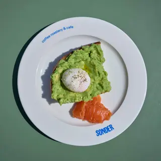 Avocado toast with poached egg  and salmon