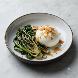 Burrata, fiocchi di bottarga e cicoria ripassata