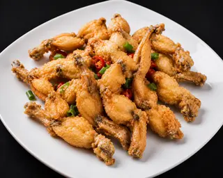 65. Cosce di rana fritte