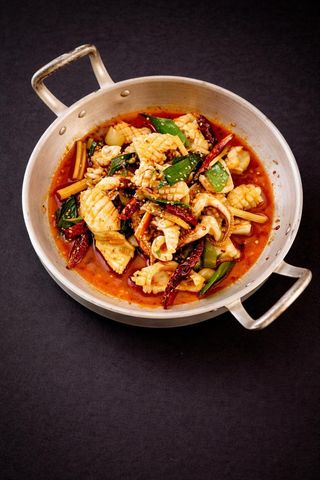 Calamari saltati in wok piccanti