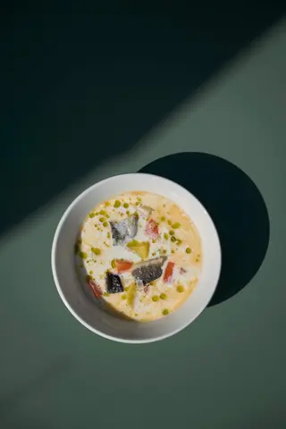 Creamy fish soup with salmon and zander