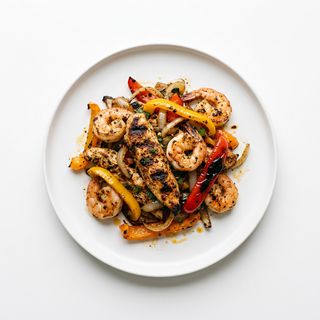 Fajitas di pollo e gamberi