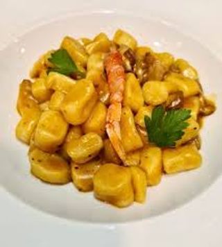 Gnocchi gamberi e porcini