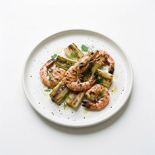 Gamberi con porri alla piastra