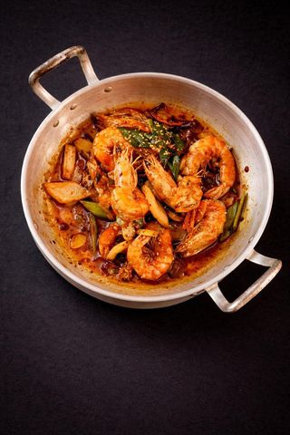 Gamberoni saltati in wok piccante