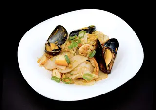 257. Gnocchi di riso con pesce misto