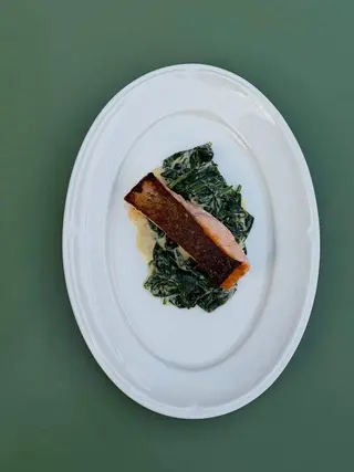 Grilled salmon with creamy spinach