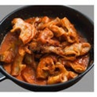 Intestino di maiale in padella piccante