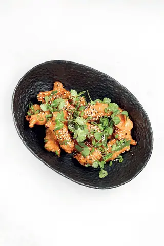 Курица в кисло-сладком соусе (350г)