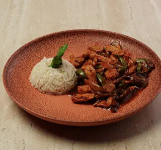 Курица с овощами в кисло-сладком соусе (200г\150г)