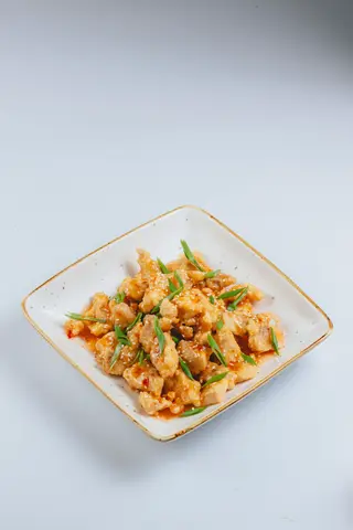 Курица в кисло-сладком соусе (300г)