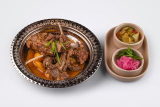 Куурдак из баранины с запечённым картофелем и луком (650г)