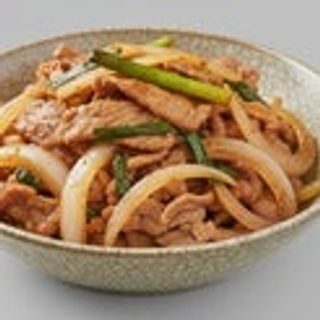 Maiale saltato con le cipolle