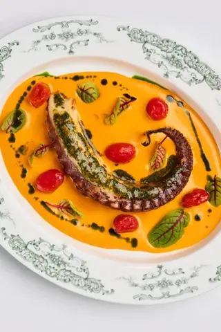 Осьминог с соусом ромеско и томатами (250г)