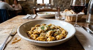 Plin ai tre arrosti con suo fondo bruno