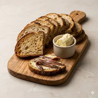 Pane, burro e acciughe