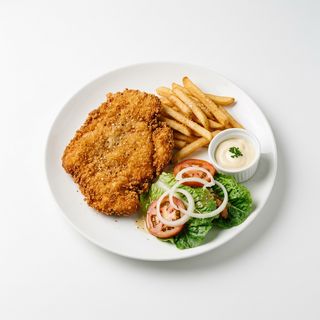 Piatto maxi cotoletta di pollo impanata