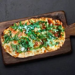 Pizza de Speck e Rúcula