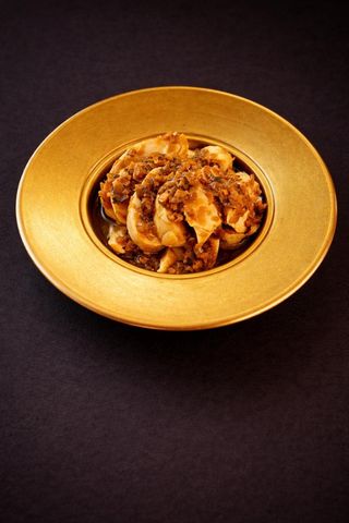 Pollo con zenzero e cipollotto