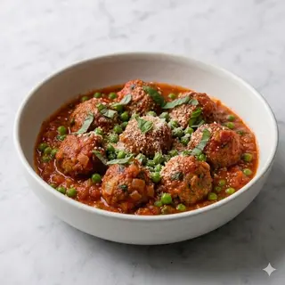 Polpette al sugo di pomodoro e piselli