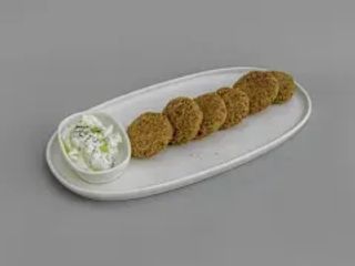 Polpette di ceci e zucchine, patatine e pita