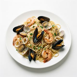 Primo + padella di mare a centro tavola