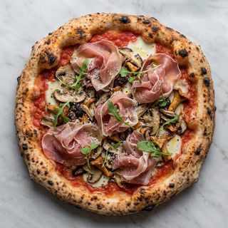Prosciutto e funghi