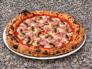 Prosciutto e funghi