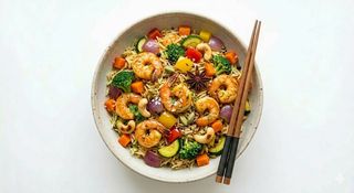 Riso biriyany con gamberi e verdure