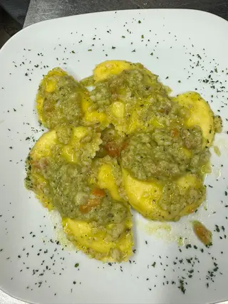 Ravioli di mare in crema di zucchine
