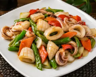 46. Seppia saltata con verdure