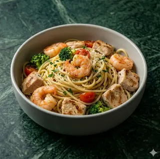 Spaghetti con gamberi e pollo