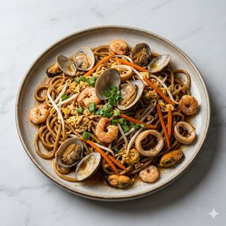 104 Spaghetti saltati con frutti di mare
