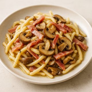 Strozzapreti speck e funghi