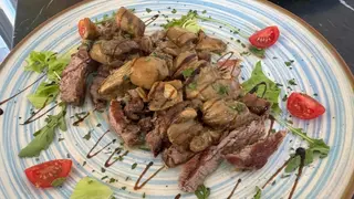 Tagliata di manzo con funghi porcini