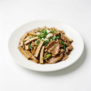 Tofu secco saltato con carne di maiale