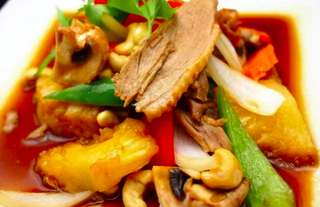 Anatra all'ananas agrodolce