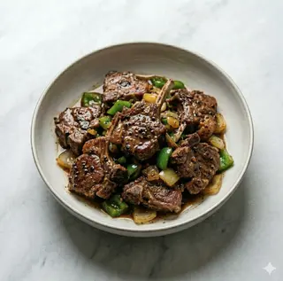 Costine di agnello saltato al pepe